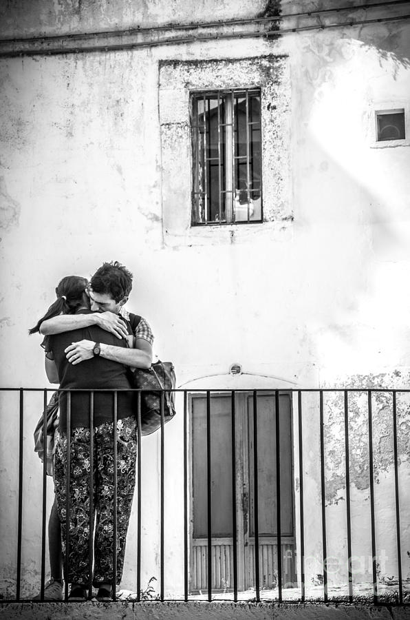 Couple Of Guys Hugging Leaning On A Railing - Black And White With Vignetting Photograph by Luca Lorenzelli