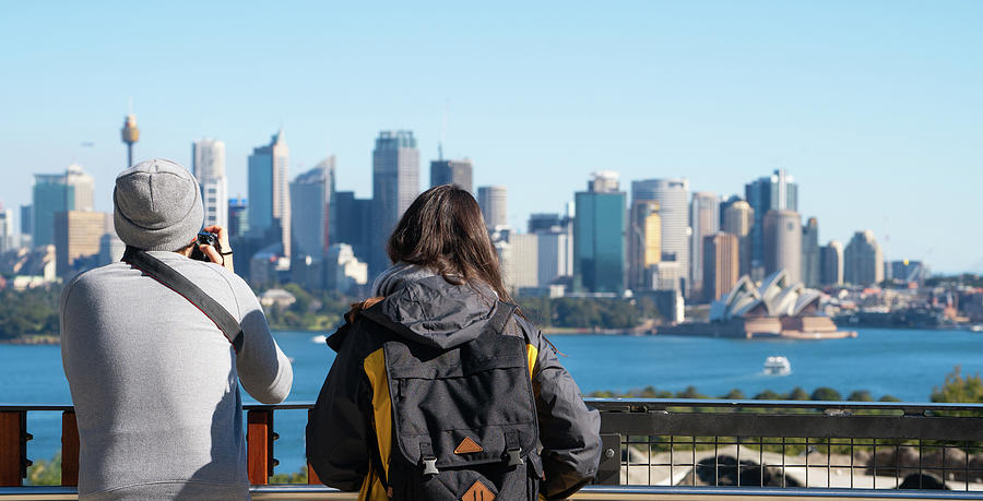 Couple of tourism stand on view point in Sydney zoo  Photograph by Anek Suwannaphoom