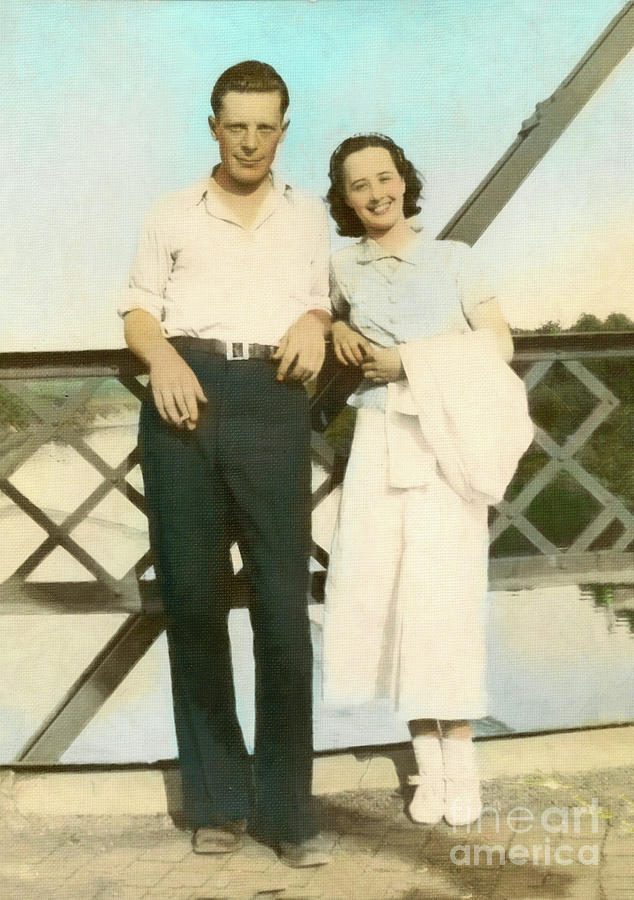 Couple on a Bridge Photograph by Donna L Munro
