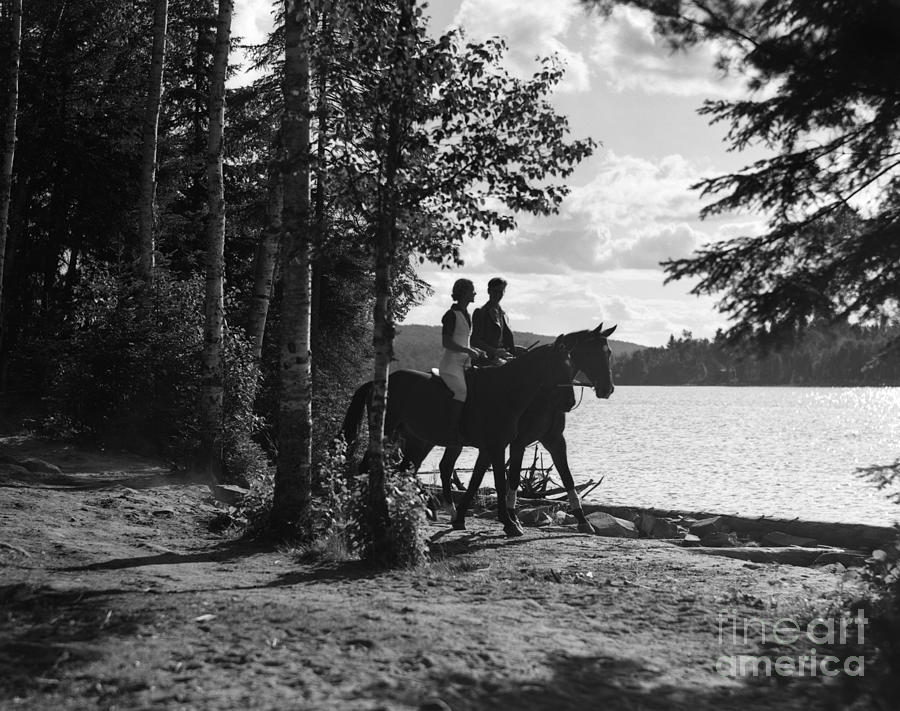 Couple On Horseback, C.1930s Photograph by H. Armstrong Roberts/ClassicStock