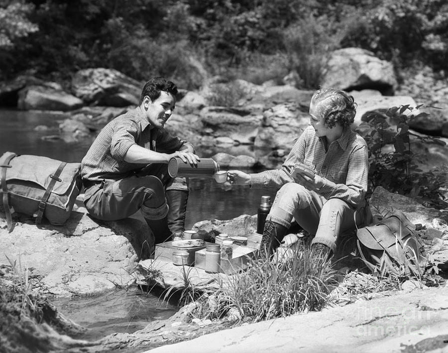 Couple Picknicking Outdoors, C.1930s Photograph by H Armstrong Roberts ClassicStock