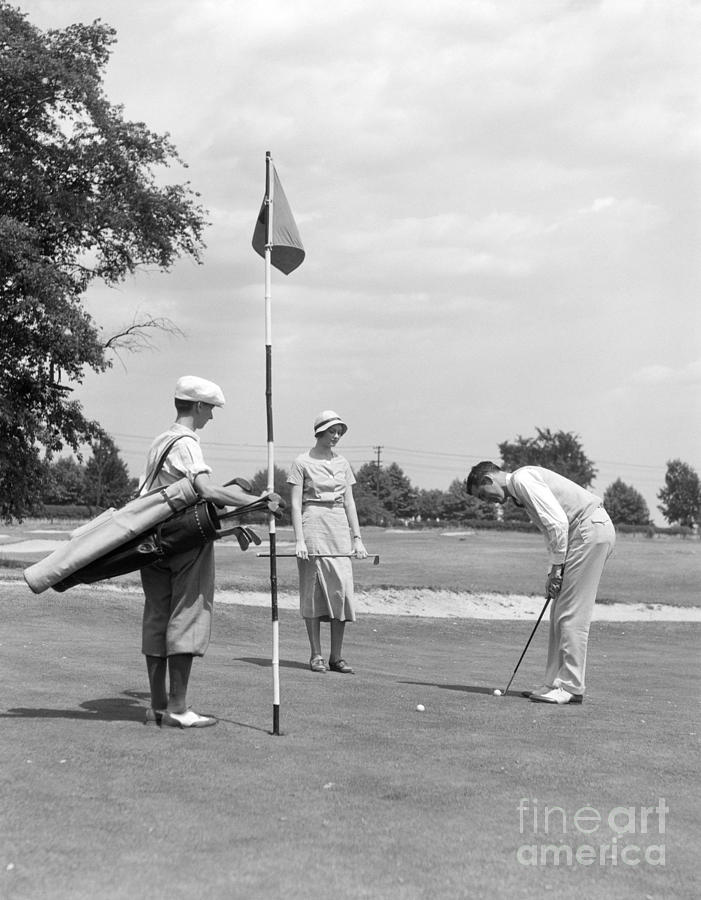 Couple Playing Golf, C.1930s Photograph by H. Armstrong Roberts/ClassicStock