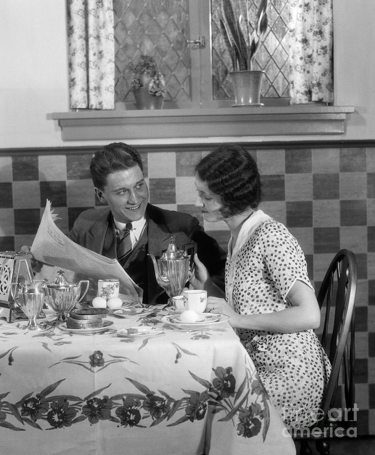 Couple Reading Paper At Breakfast Photograph by H. Armstrong Roberts/ClassicStock
