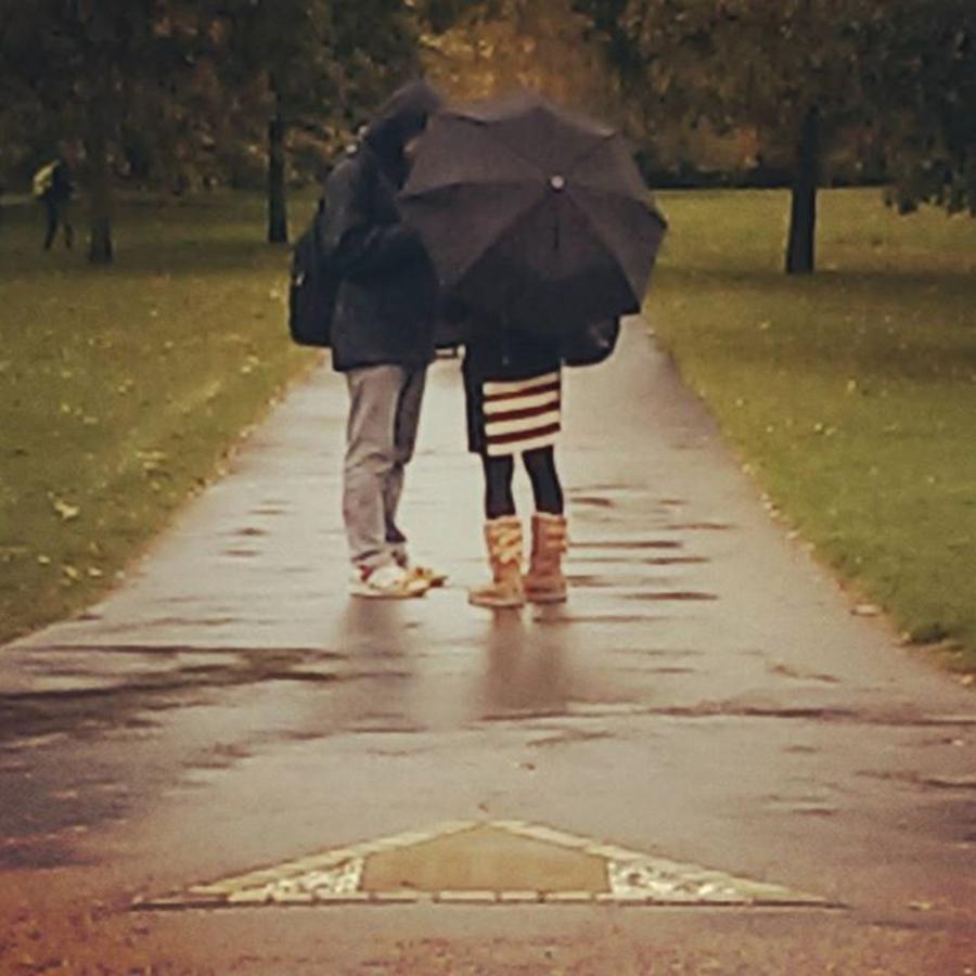 Beautiful Photograph - Couple Walking In The #rain At by Leandros Kounadis