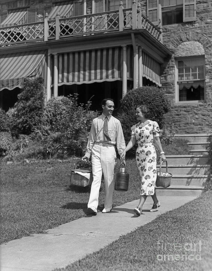 Couple Walking Out Of House, C.1930s Photograph by H. Armstrong Roberts/ClassicStock