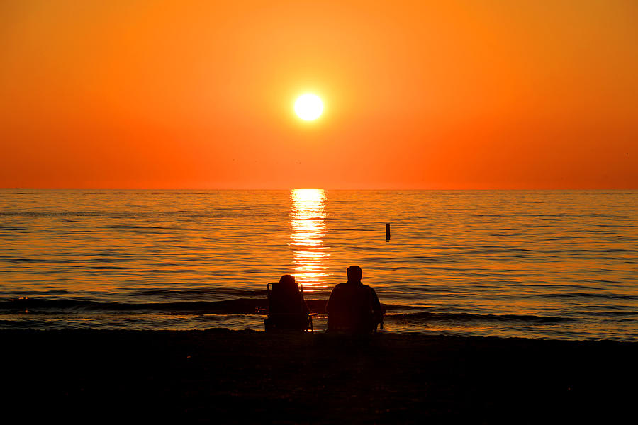 Couple Watches Sunset Photograph by Kevin Cable