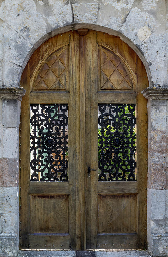 Courtyard Door in Villereal Photograph by Georgia Clare