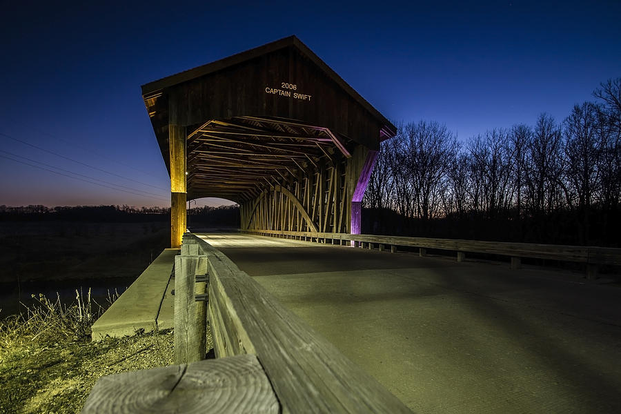 Covered Bridge at dusk with light painting Photograph by Sven Brogren