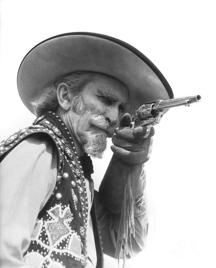 Hat Photograph - Cowboy Aiming A Gun, C.1930s by H. Armstrong Roberts/ClassicStock