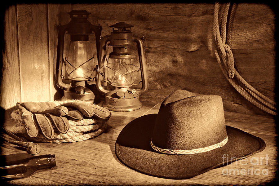 https://images.fineartamerica.com/images/artworkimages/mediumlarge/1/cowboy-hat-and-kerosene-lanterns-american-west-legend-by-olivier-le-queinec.jpg