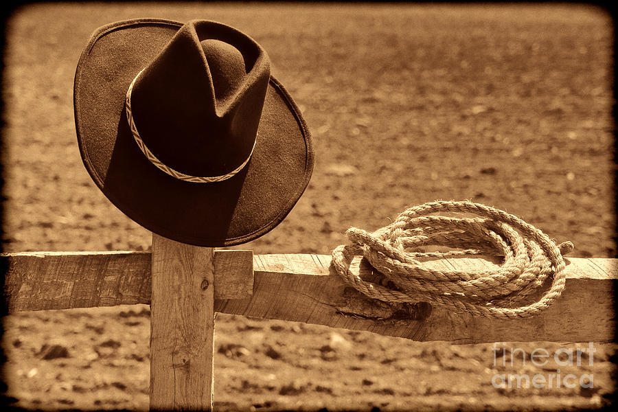 Cowboy Hat and Rope on a Fence Photograph by American West Legend