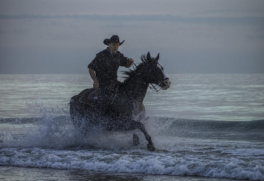 Cowboy Riding in the Surf Photograph by Dorothy Cunningham