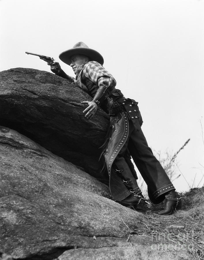 Cowboy Taking Aim, C.1920s Photograph by H. Armstrong Roberts/ClassicStock