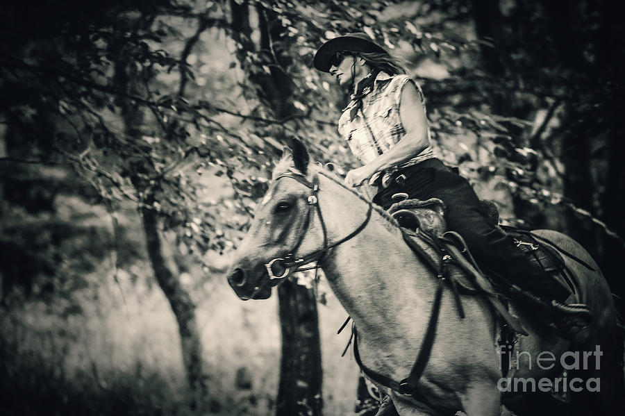 Cowgirl riding in the forest Photograph by Dimitar Hristov