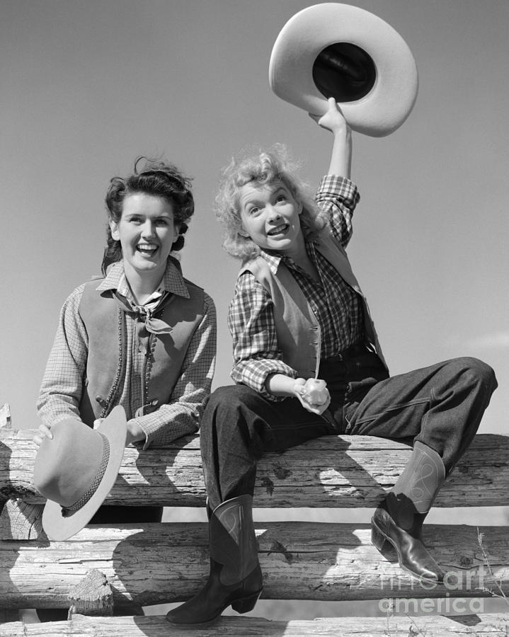 Cowgirls Sitting On A Fence, C.1940s Photograph by H. Armstrong Roberts/ClassicStock
