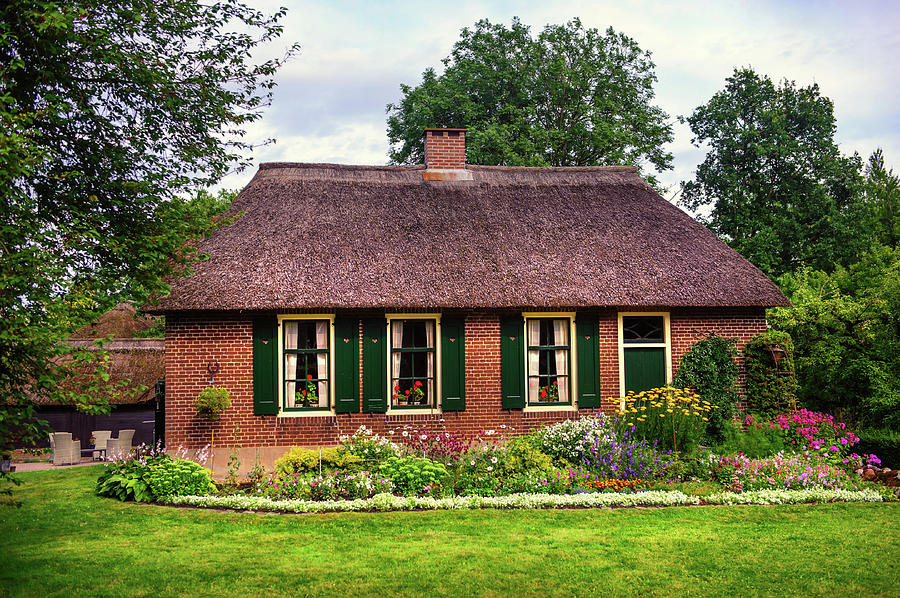 Cozy Cottage with Garden in Giethoorn. The Netherlands Photograph by Jenny Rainbow