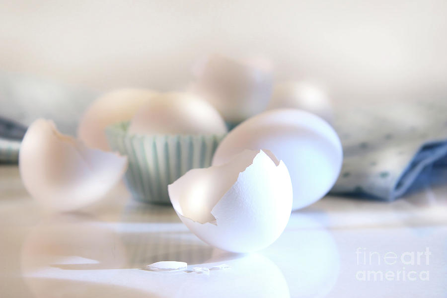 Easter Photograph - Cracked egg shell on the counter by Sandra Cunningham