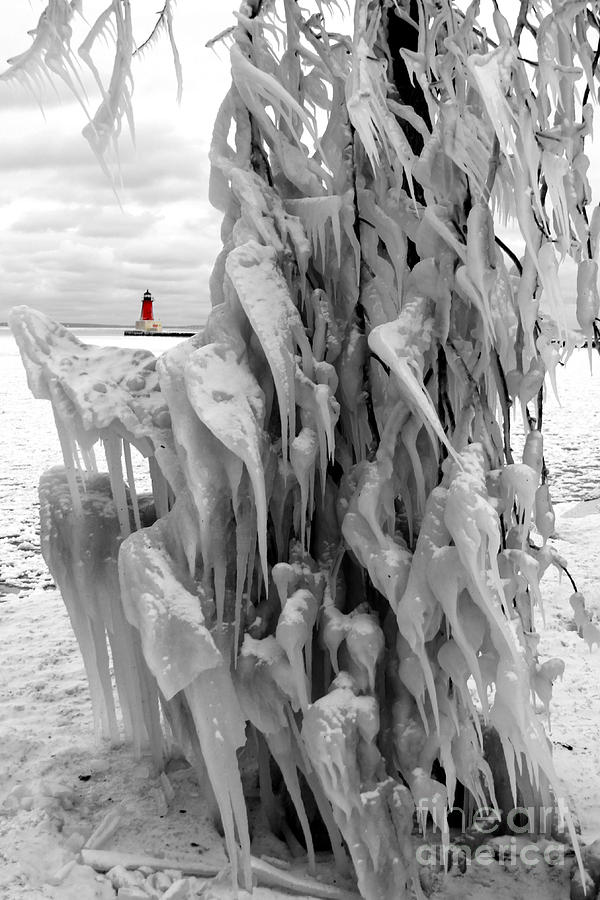Cradled in Ice - Menominee North Pier Lighthouse Photograph by Mark J Seefeldt