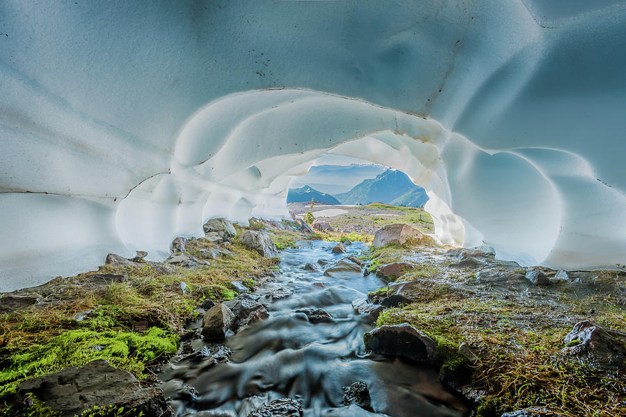 Creek Flows Through Snow Cave Photograph by Kelly VanDellen