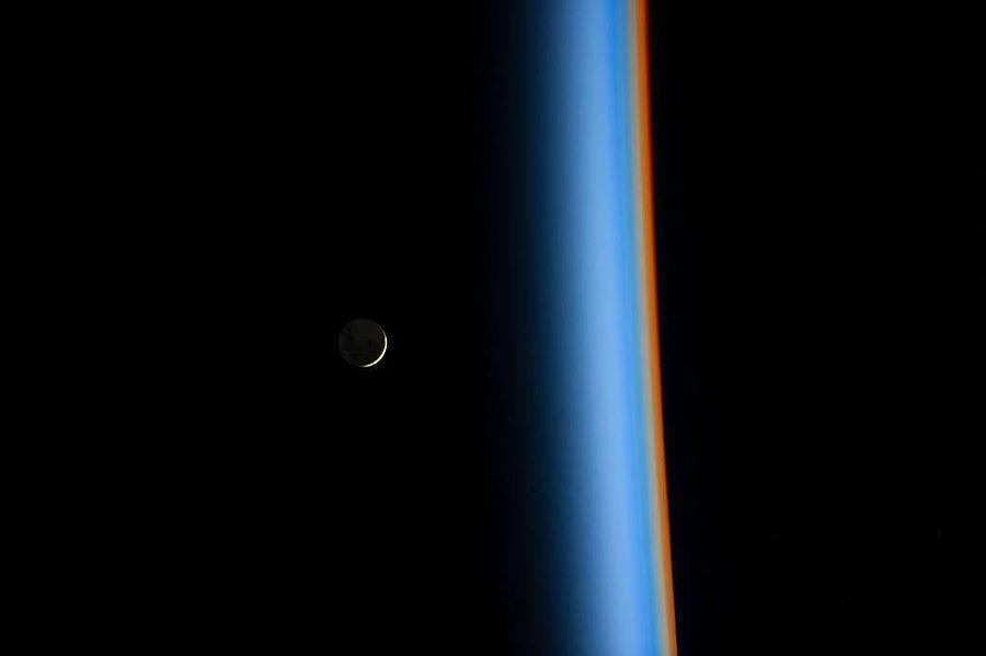 Crescent Moon Rising and Earths Atmosphere by nasa Painting by Celestial Images