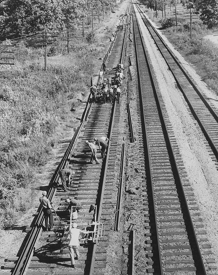Crew Lays Rails Photograph by Chicago and North Western Historical Society