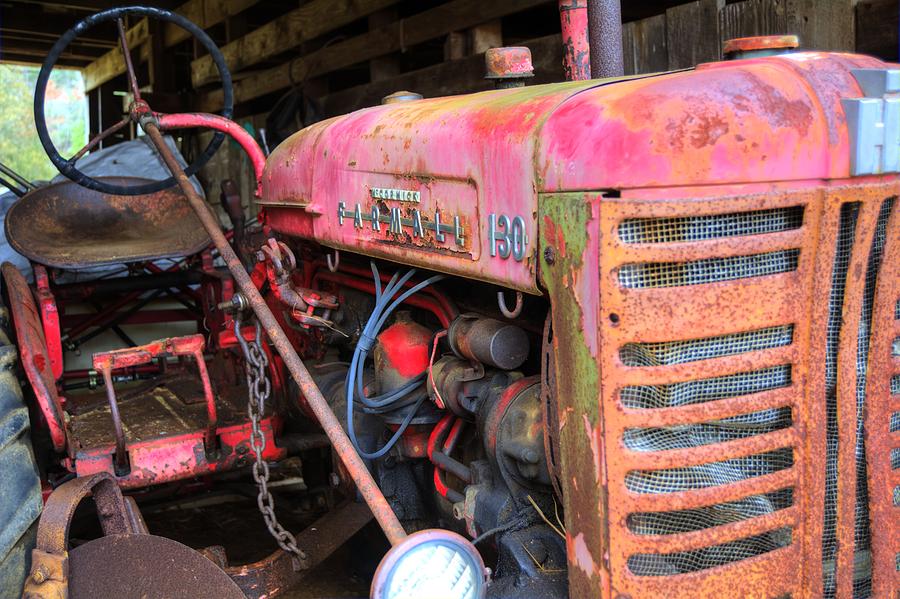 Crimson Rusty Tractor Photograph by FineArtRoyal Joshua Mimbs