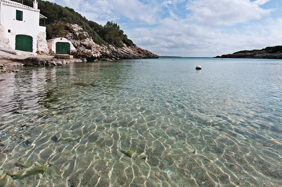 Cristaline water and vintage mediterranean seaside hut Photograph by Pedro Cardona Llambias