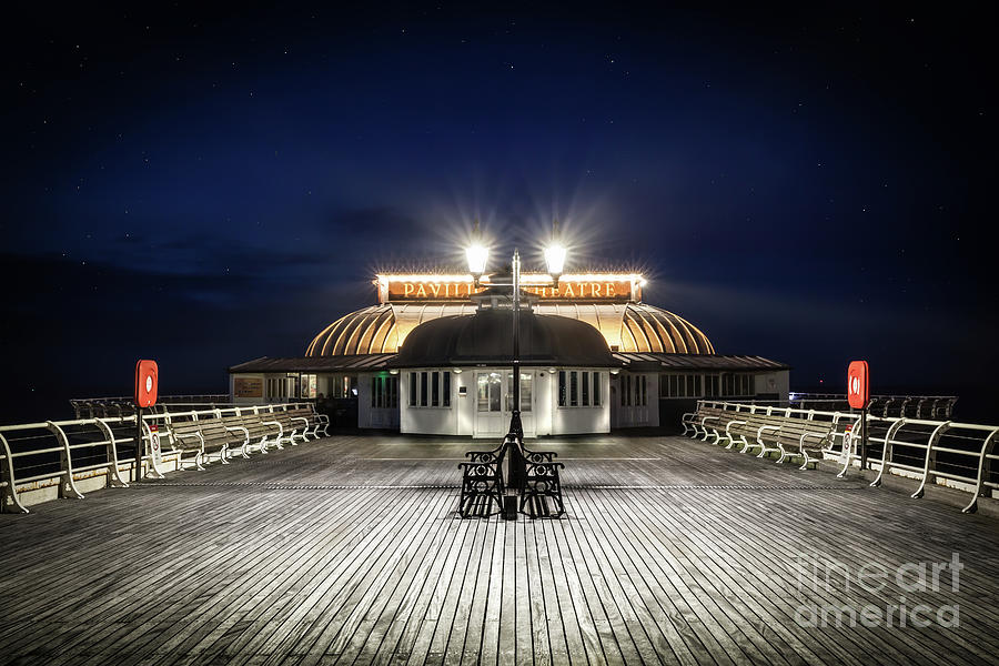 Cromer pier pavilion at night  Photograph by Simon Bratt
