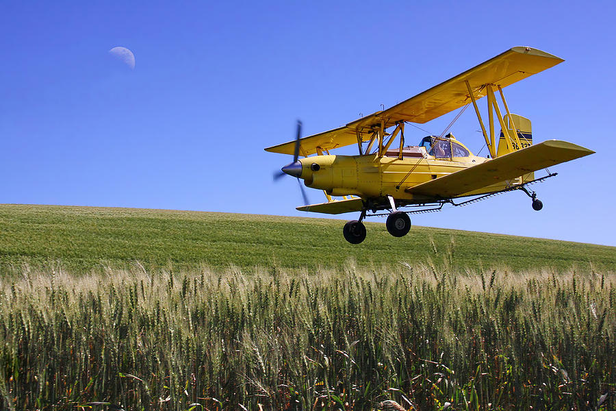 crop-duster-in-action-photograph-by-doug-oriard