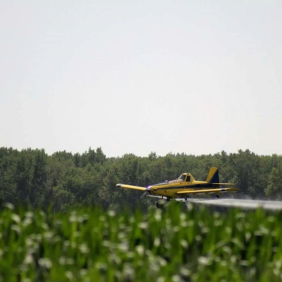 Crop Dusting Photograph by Pauline Motis Fine Art America