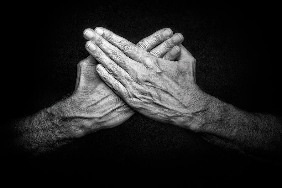 Crossed man's hands Photograph by Alain De Maximy - Fine Art America