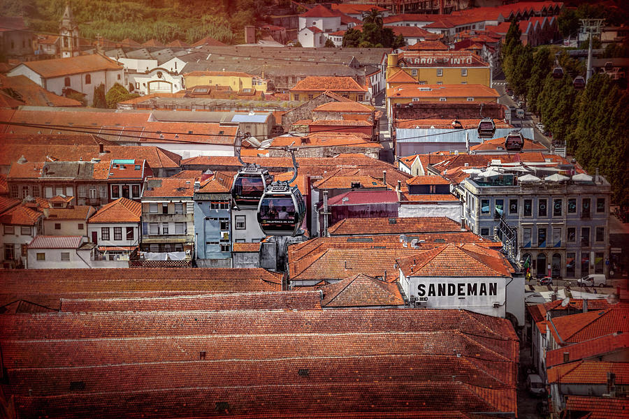 Architecture Photograph - Crossing The Red Rooftops of Porto Portugal  by Carol Japp