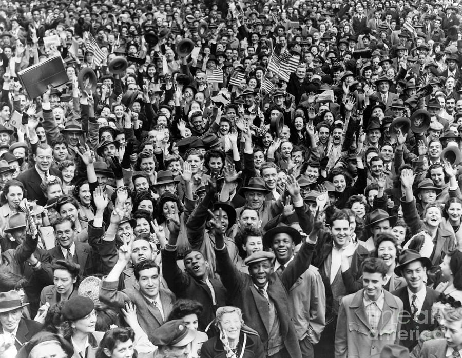 Crowds in NYC Time Square celebrate VE Day. 1945 Photograph by Anthony
