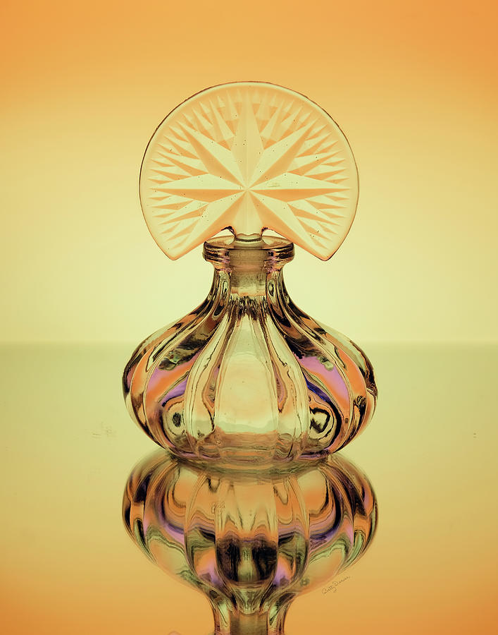 Still Life Photograph - Crowned Perfume Bottle by Betty Denise
