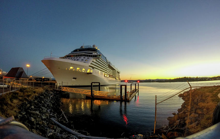 Cruise Ship Moored In Port Of A City At Sunset Photograph by Alex Grichenko