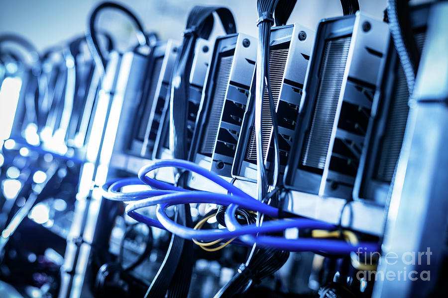 Cryptocurrency mining farm in a close-up shot. Photograph by Michal Bednarek