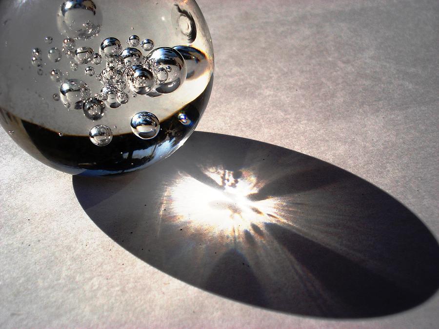 Crystal ball with trapped air bubbles Photograph by Sumit Mehndiratta