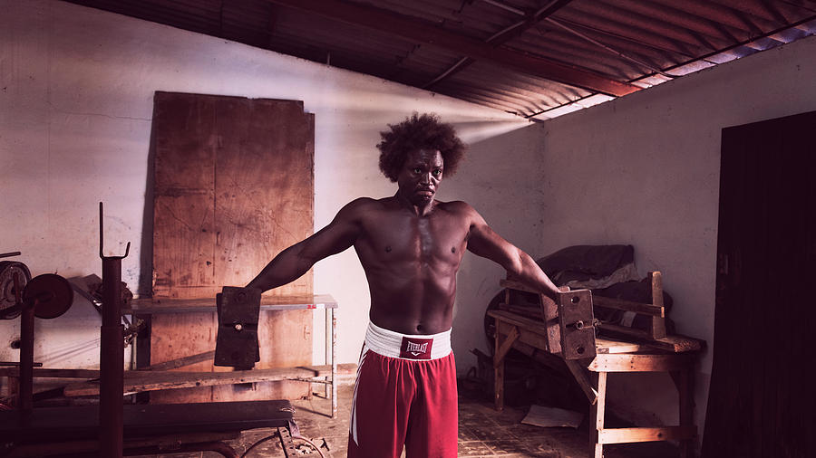 Athlete Photograph - Cuban Boxer in Training by Joan Carroll
