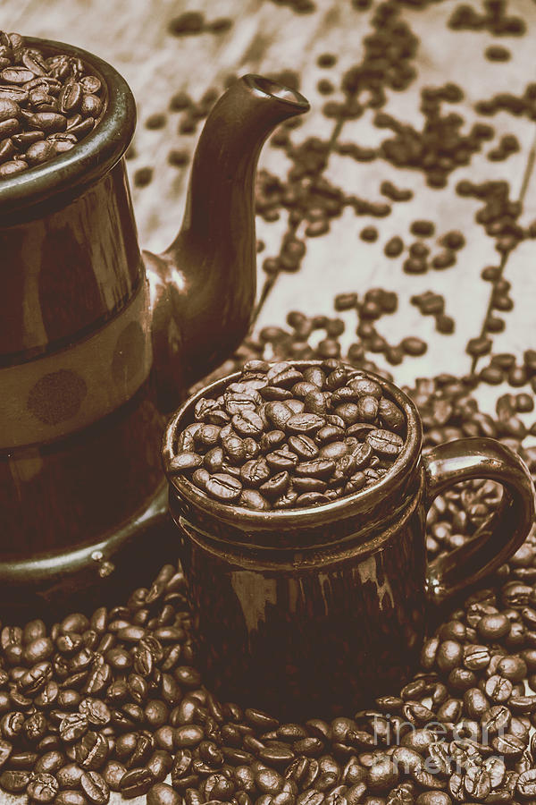 Cup And Teapot Filled With Roasted Coffee Beans Photograph by Jorgo Photography