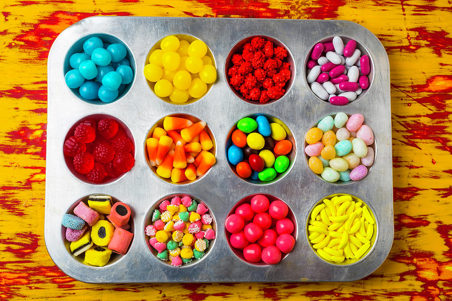 Still Life Photograph - Cup Cake Tray Full Of Candy by Garry Gay