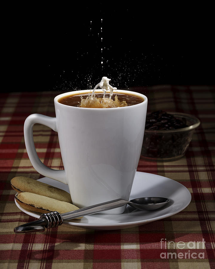 Cup of Coffee with a Splash of Milk Photograph by Art Whitton