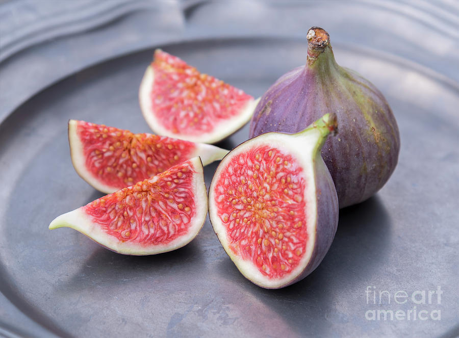 Cut fresh figs Photograph by Sophie McAulay