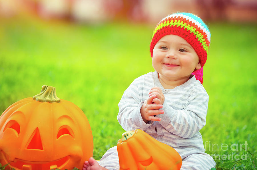 Cute baby playing with pumpkins Photograph by Anna Om