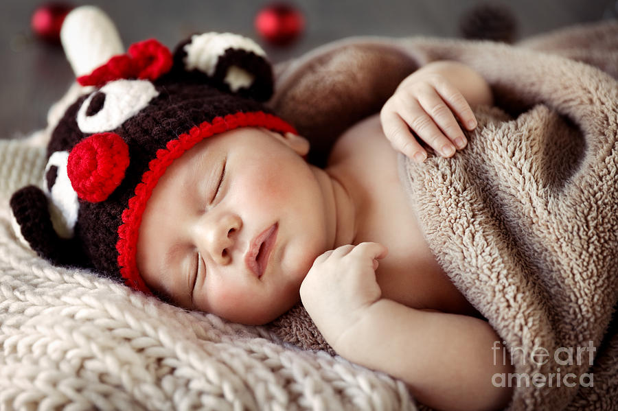 Cute baby sleeping in Christmas pajamas Photograph by Anna Om