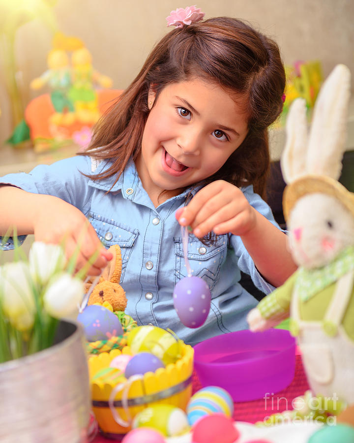 Cute girl decorate Easter eggs Photograph by Anna Om