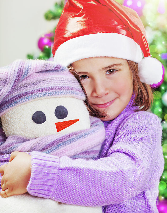 Cute girl with snowman toy Photograph by Anna Om