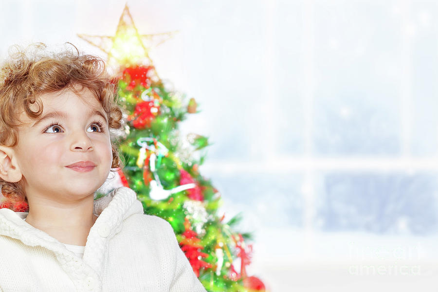 Cute little boy near Christmas tree Photograph by Anna Om