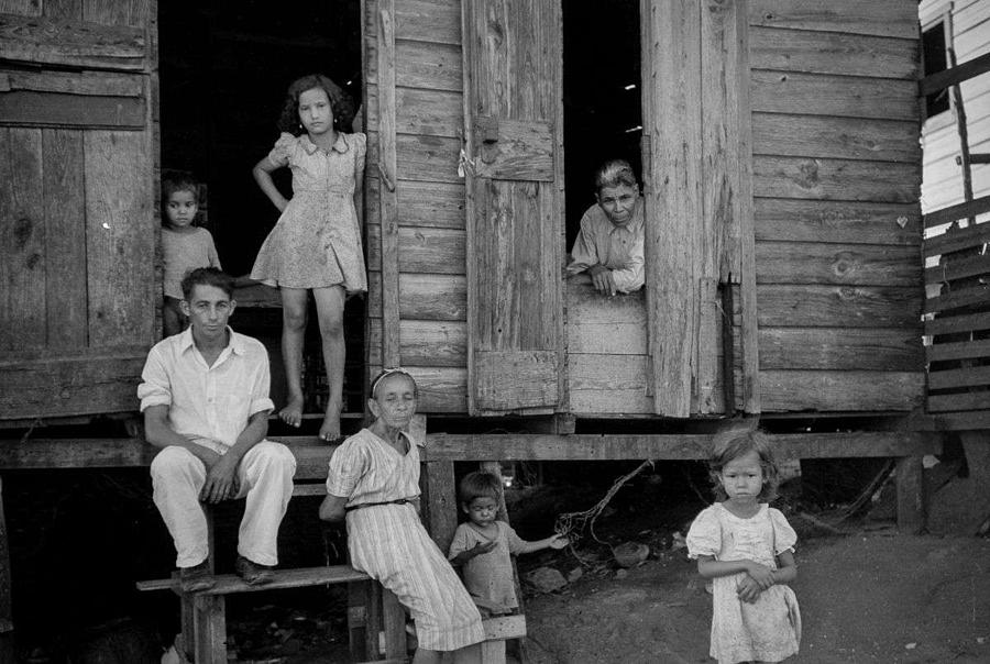 Summer Painting - Daily Life in Puerto Rico, c. 1938-1942, by Jack Delano, FSA, A family in a slum in Yauco. by Celestial Images