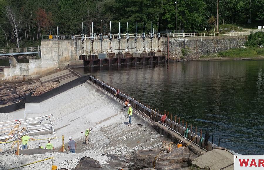 Dam Repairs  along the Androscoggin River Photograph by Mike Breau
