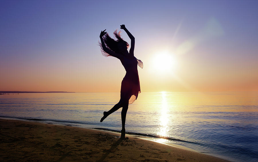 dancer on beach sunset